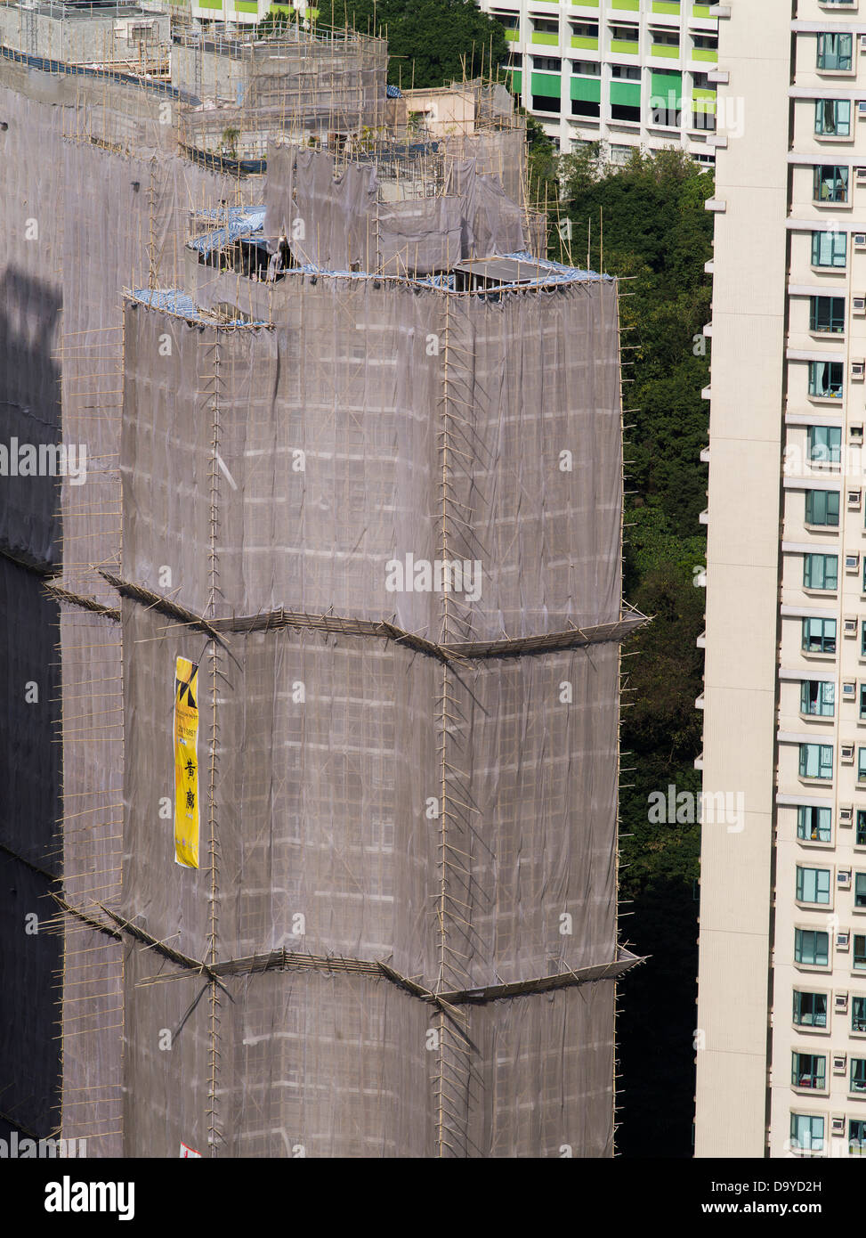 dh Bau von Wolkenkratzern CAUSEWAY BAY HONGKONG Bau von Bambusgerüsten Gebäude China Gerüste Wolkenkratzer Wohnungen werden gebaut Stockfoto