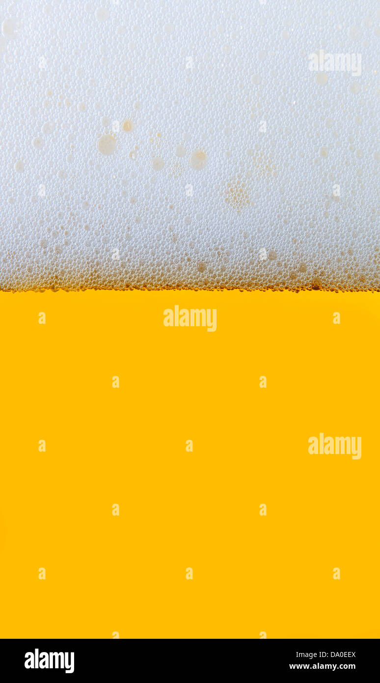 Bier - taufrischen Bier im Glas als Textur Stockfoto