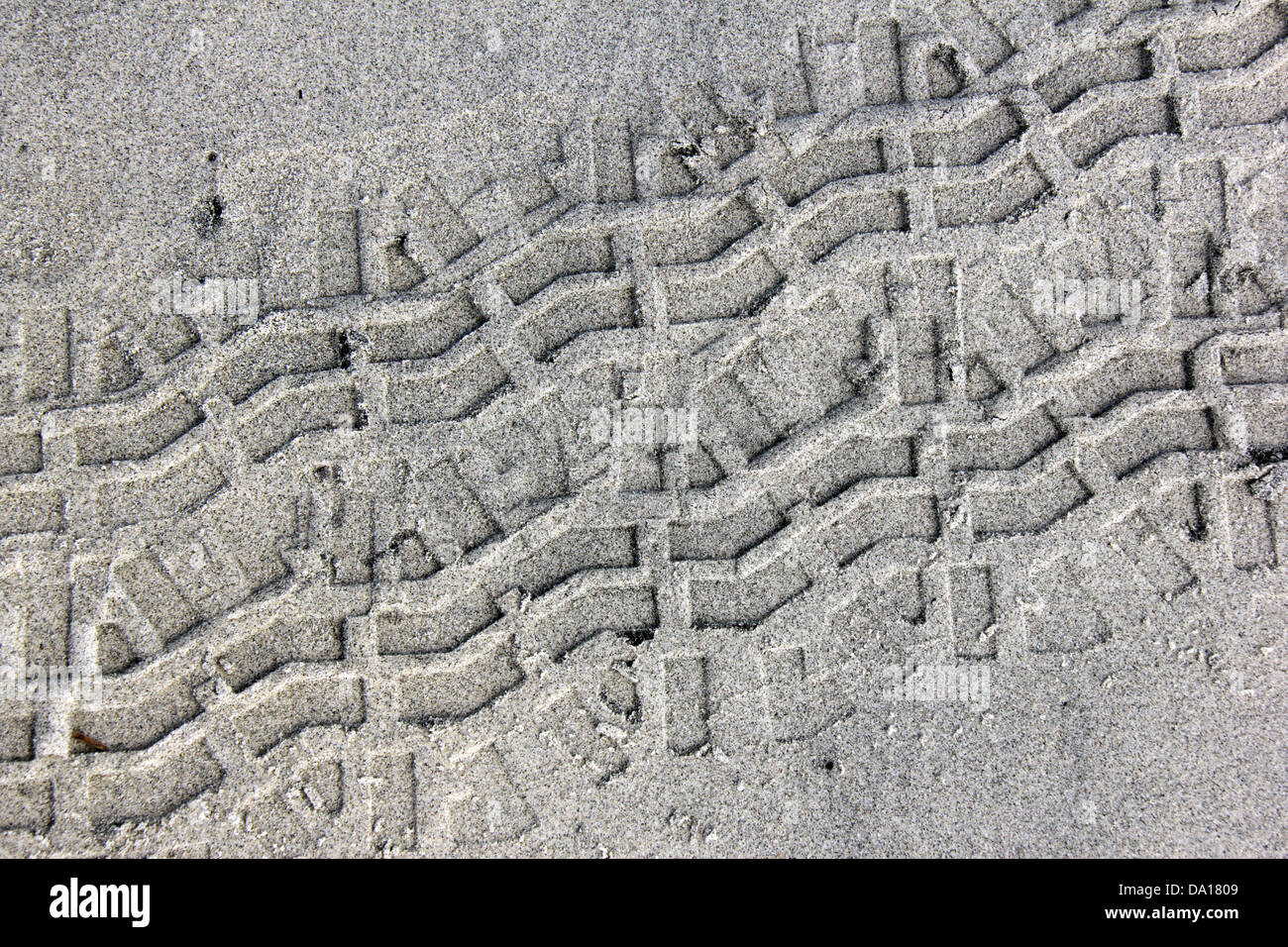 Rad-Impressionen auf Sand. Stockfoto