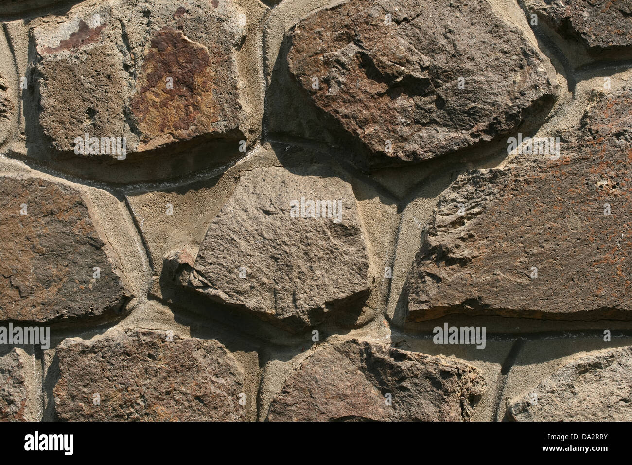 Dies ist eine Wand aus Steinen, wie einige steinerne Hintergrund. Stockfoto