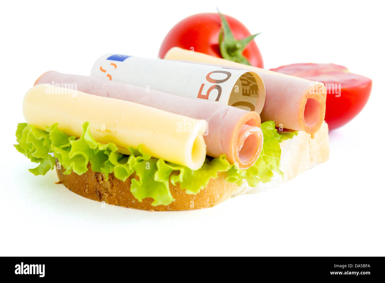 Sandwich und Geld, das den Hunger nach Geld darstellt Stockfoto