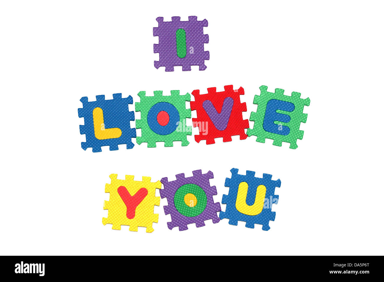 Nachricht: I Love You von Buchstaben Puzzle, isoliert auf weißem Hintergrund. Stockfoto
