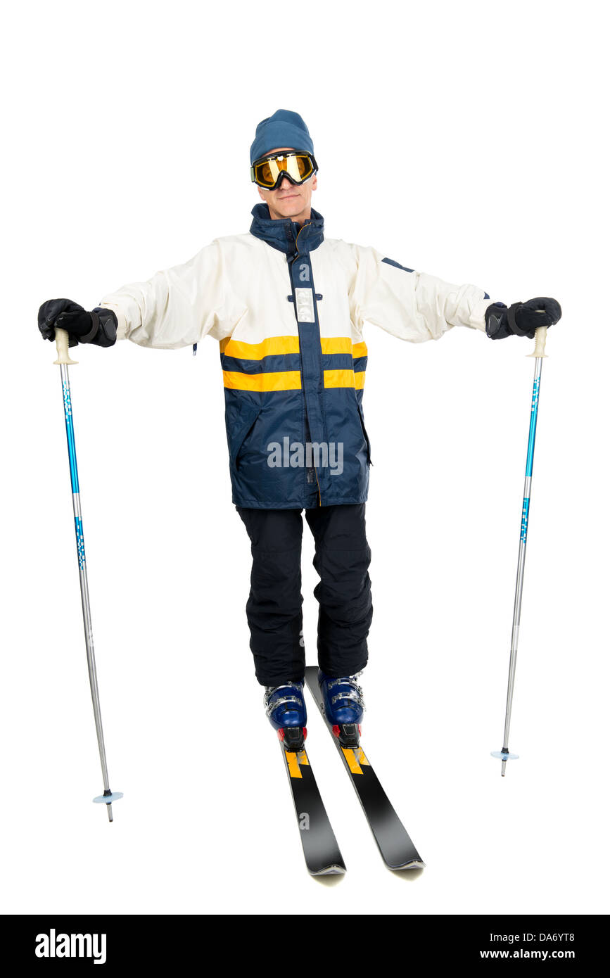 Skifahrer in voller Montur isoliert in weiß Stockfoto