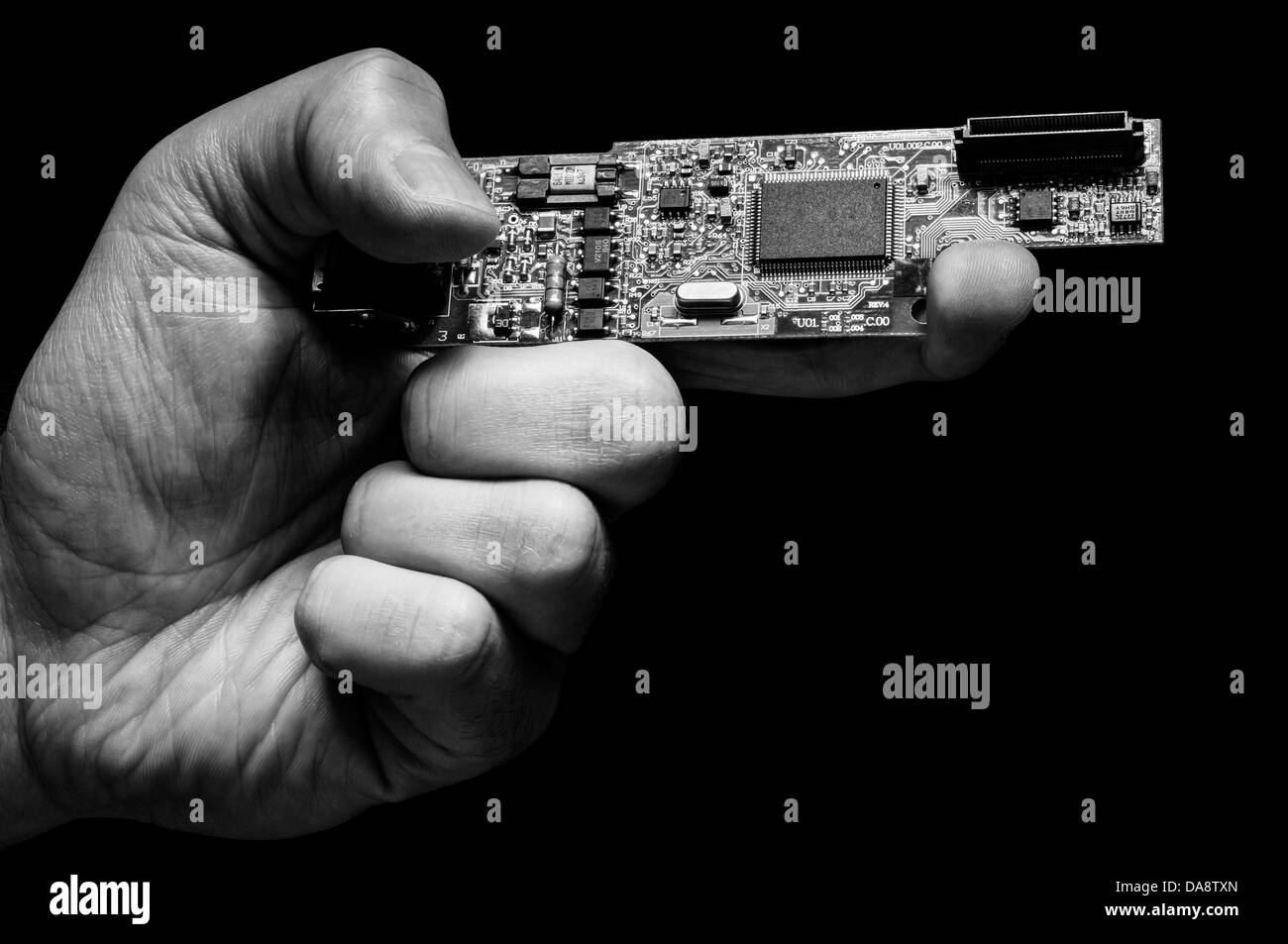 Hand mit einem digitalen Waffe Stockfoto