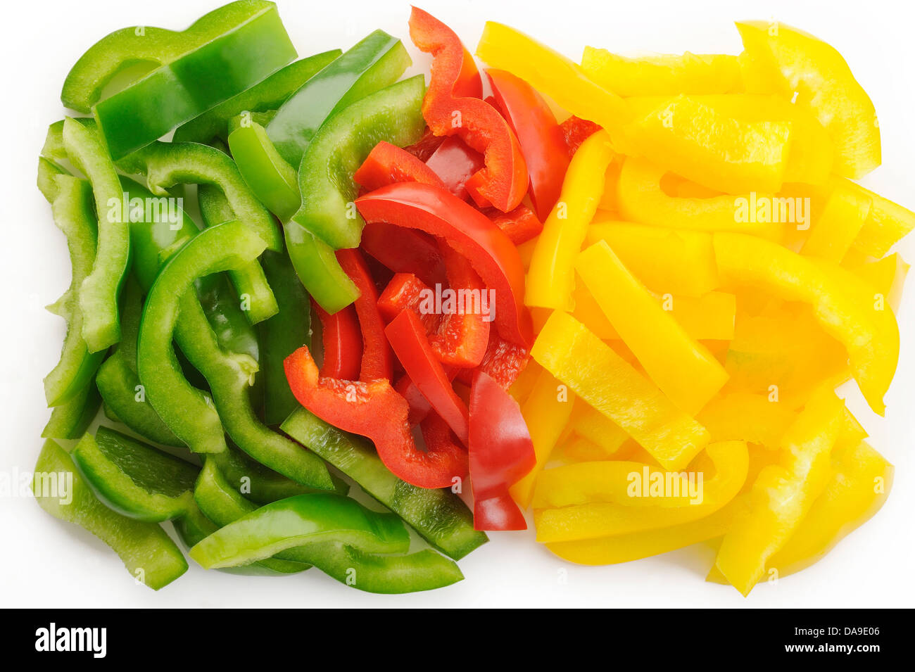 Paprika-Scheiben auf weißem Hintergrund Stockfoto