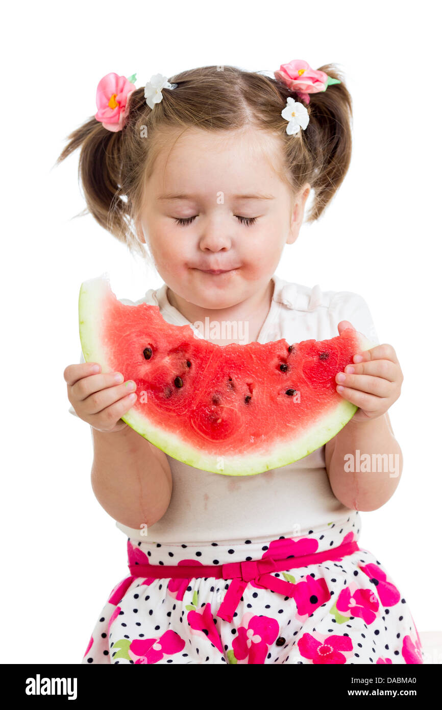 Kind Mädchen essen Wassermelone isoliert auf weiss Stockfoto
