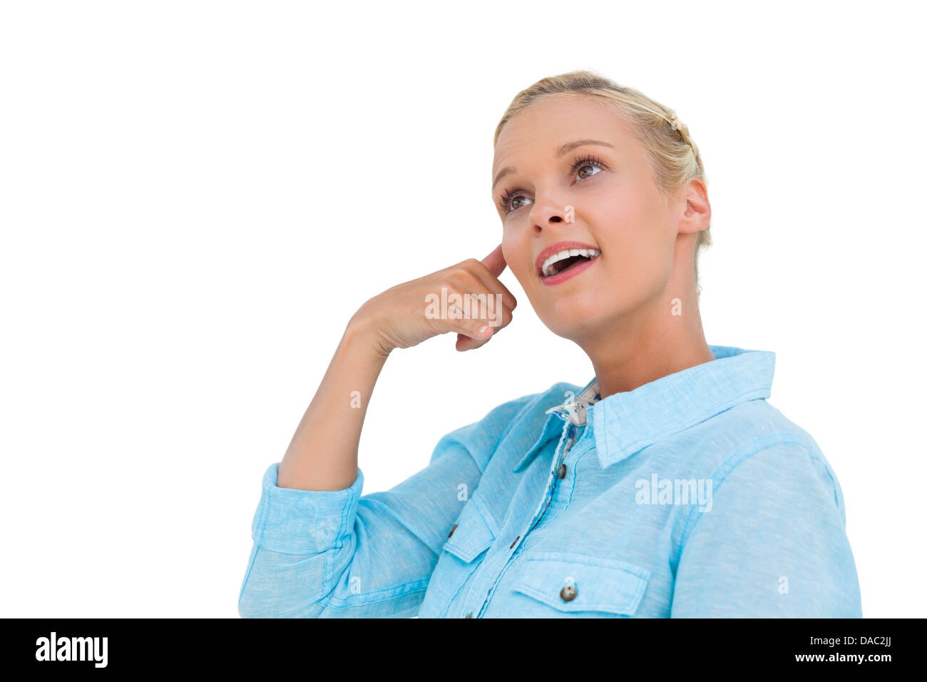 Attraktive Blondine ein Symbol des Telefons mit der Hand machen und nachschlagen Stockfoto