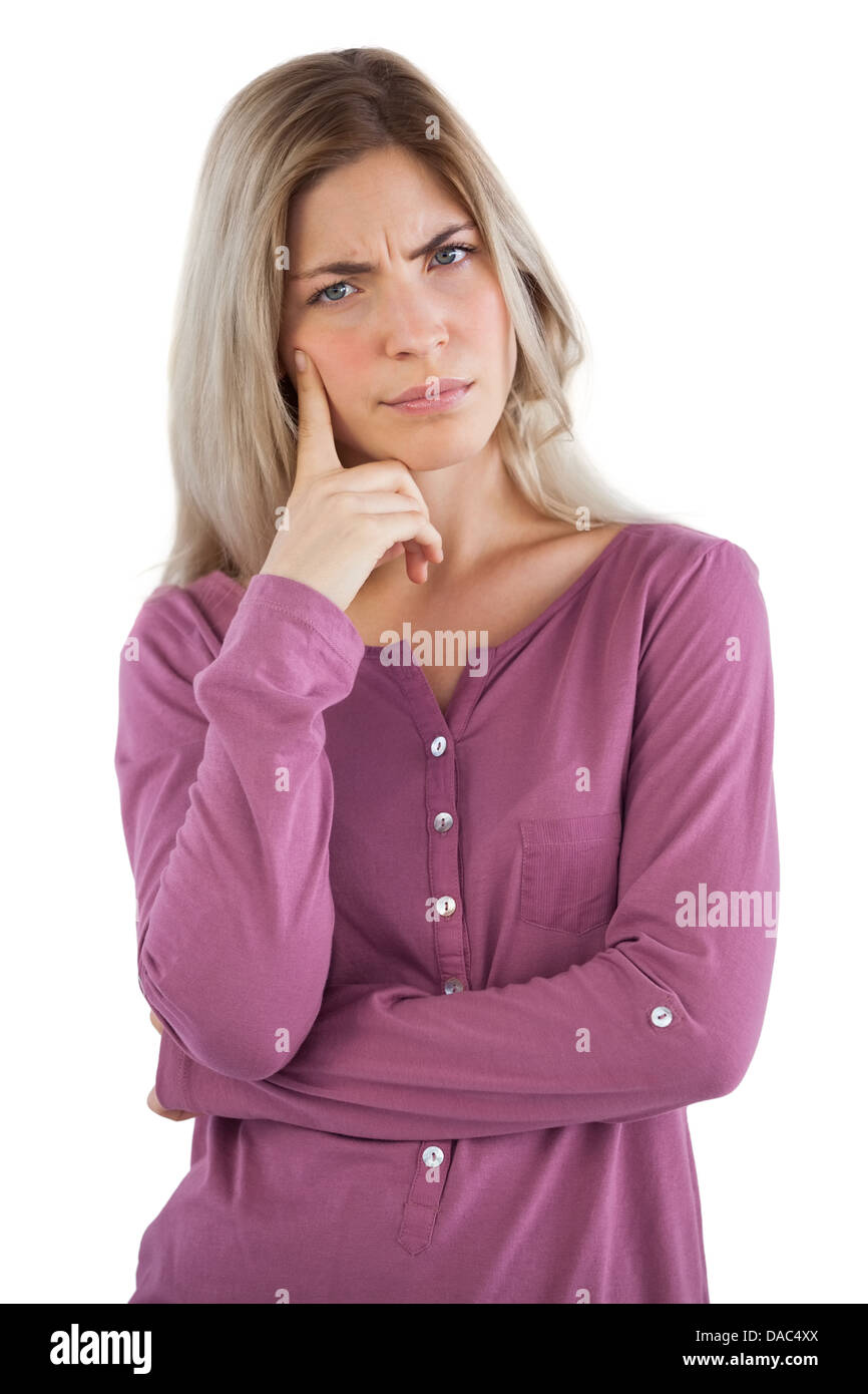 Unruhigen Frau mit Hand am Kinn Stockfoto