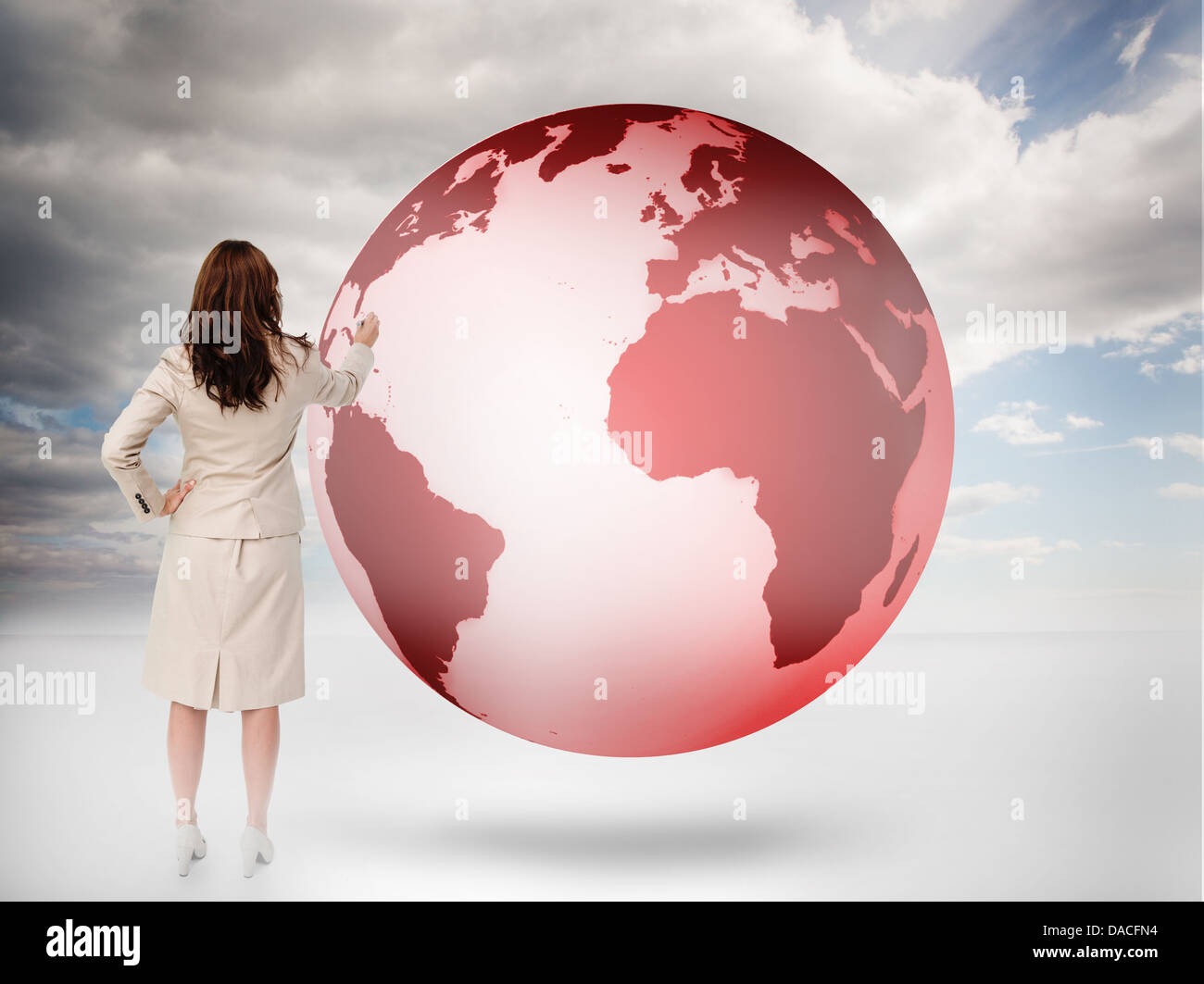 Geschäftsfrau, die Zeichnung auf einem roten Planeten Stockfoto