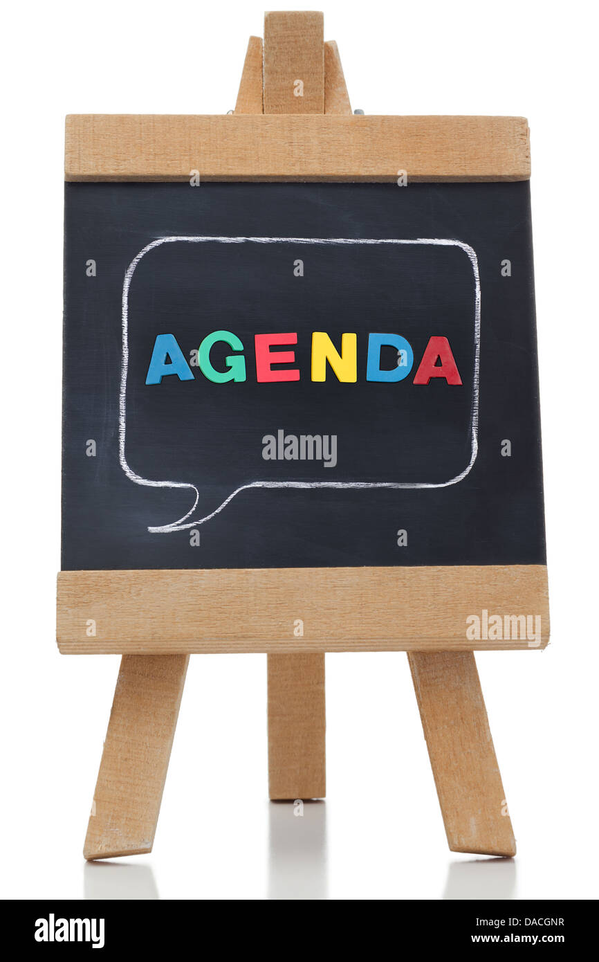 Agenda, die auf eine Tafel mit farbigen Buchstaben geschrieben Stockfoto