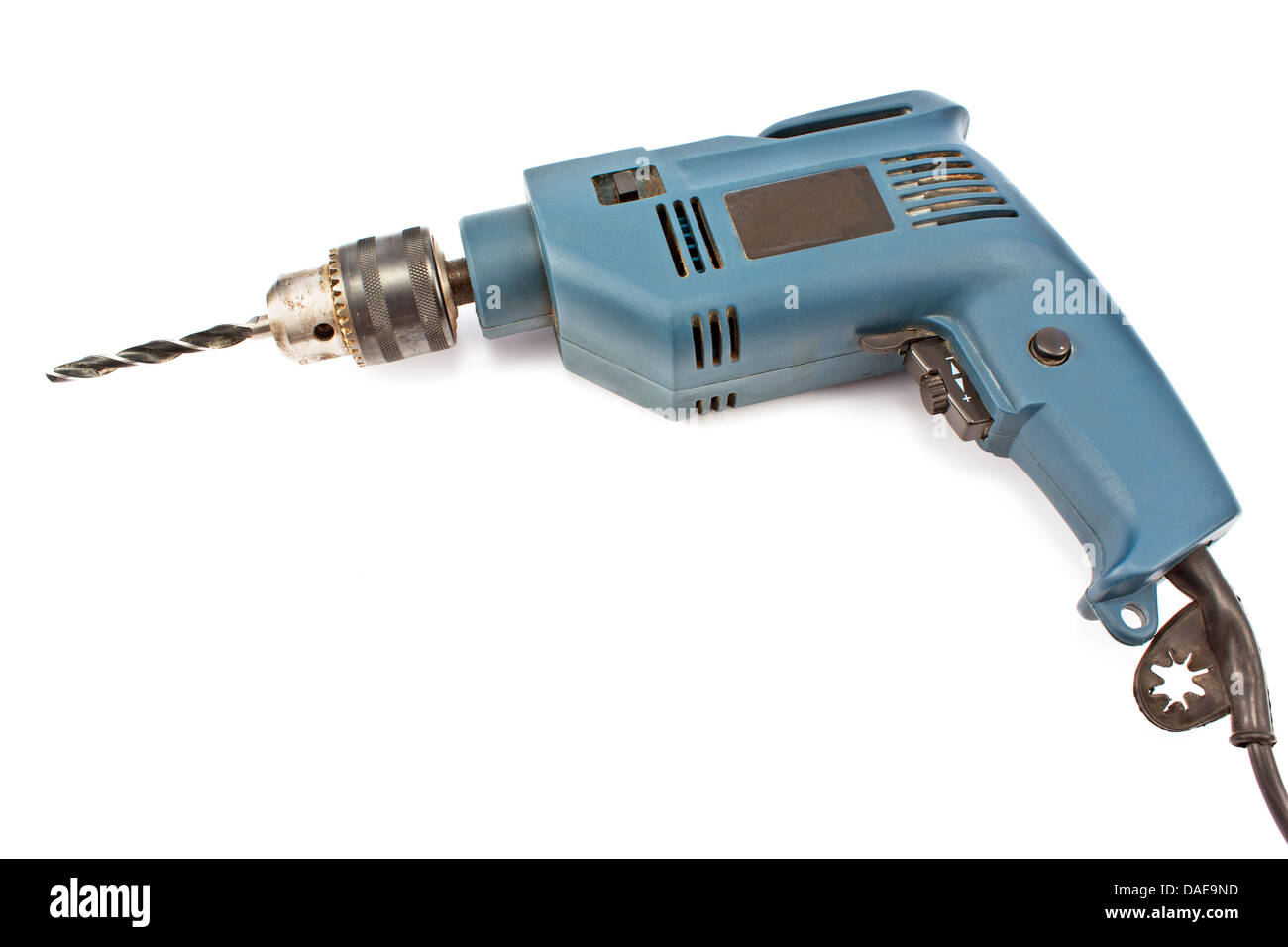 Gebrauchte alte Bohrmaschine isoliert auf weiss Stockfoto