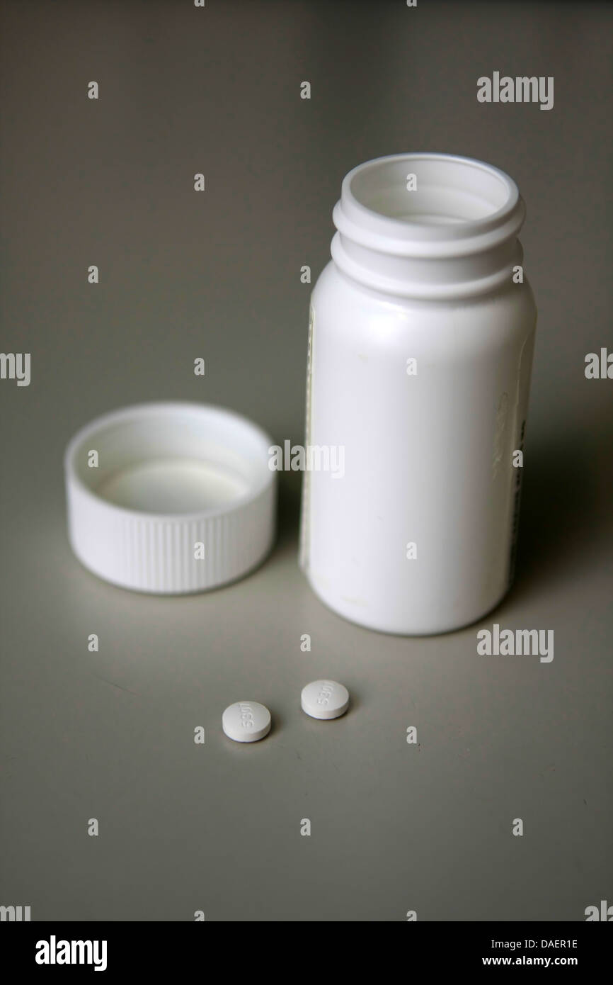 weißen Pillen aus weißen Flasche Medizin, Drogen, Medikamente Stockfoto