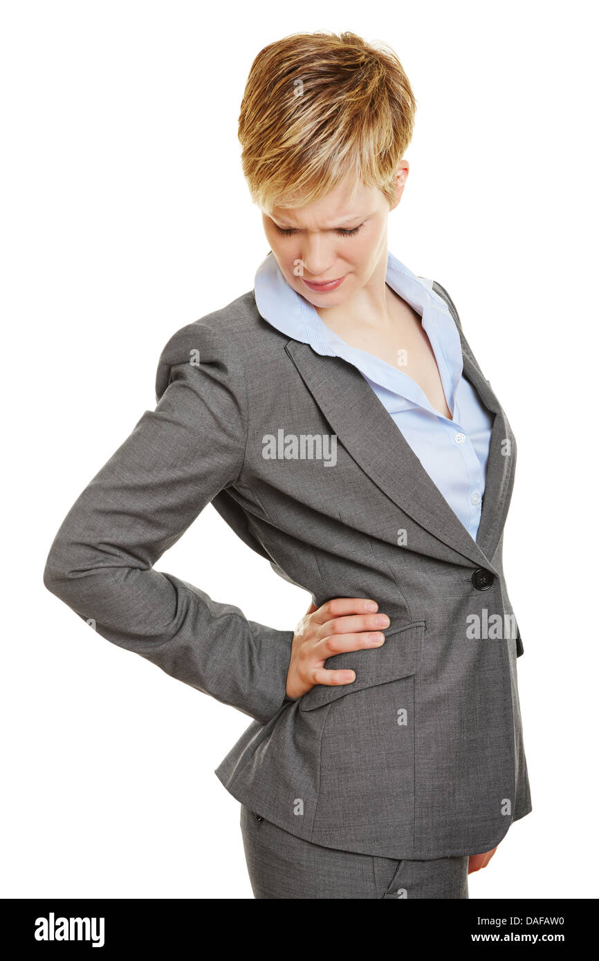 Business-Frau mit Schmerzen im Rücken hält die Hand auf dem Rücken Stockfoto