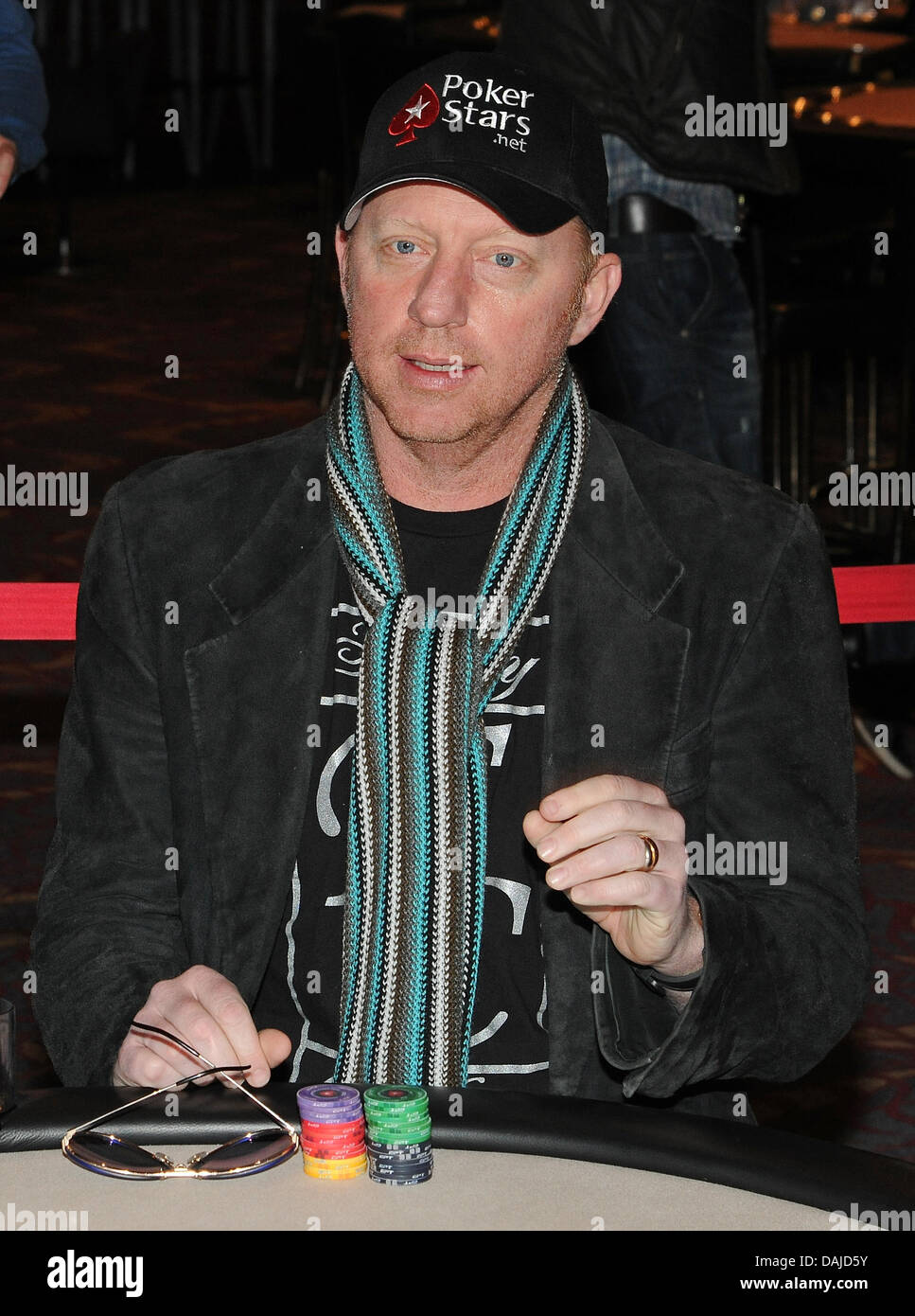 Ehemaliger deutscher Profi-Tennisspieler Boris Becker sitzt an einem Kartentische im Casino Berlin während der Berlin-Poker-Turnier der European Poker Tour (EPT) in Berlin, Deutschland, 5. April 2011. Das Turnier bestehend aus 800 Teilnehmern findet bis zum 10. April 2011. Das Turnier mit 800 Teilnehmern findet bis zum 10. April. Foto: Jens Kalaene Stockfoto