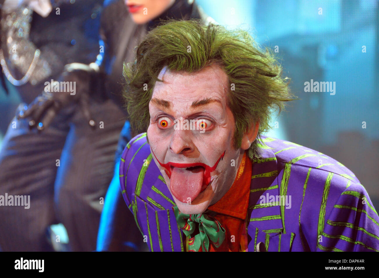 Der Schauspieler Garry See führt als Joker während einer Probe Foto von der Show-Produktion "Batman Live" in London, Großbritannien, 12. April 2011. Seit Jahrzehnten, die Batman gegen das Böse gekämpft hat, wird jetzt der Action-Held eine riesige Aktion Show gehören. "Batman Live" Sterne die Held in eine neue Live-Show, das am 24. August 2011 am O2 Arena in London uraufgeführt. Vom 11. Januar 2012, die sho Stockfoto