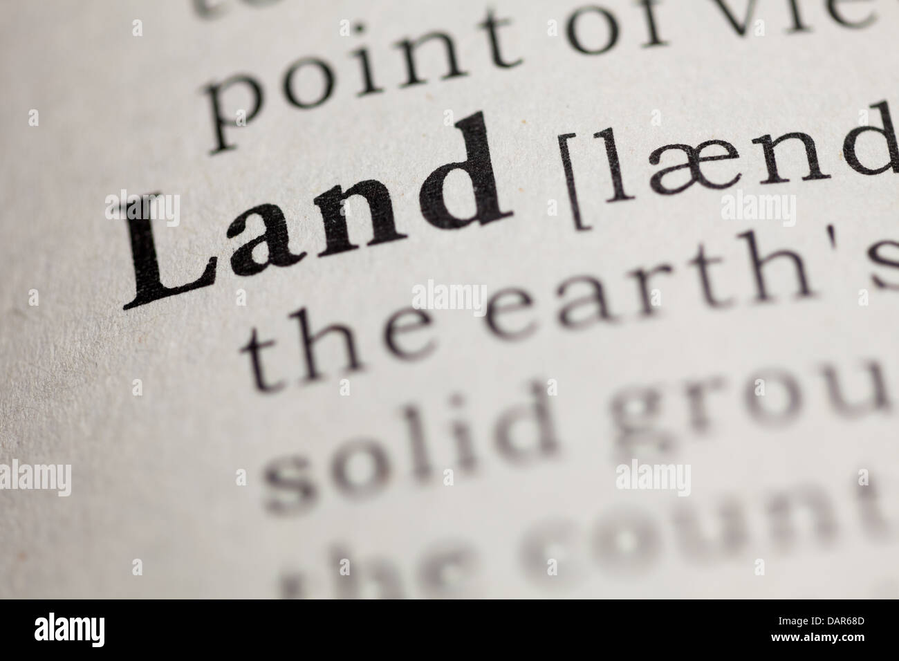 Gefälschte Wörterbuch, Wörterbuch-Definition des Wortes Land. Stockfoto