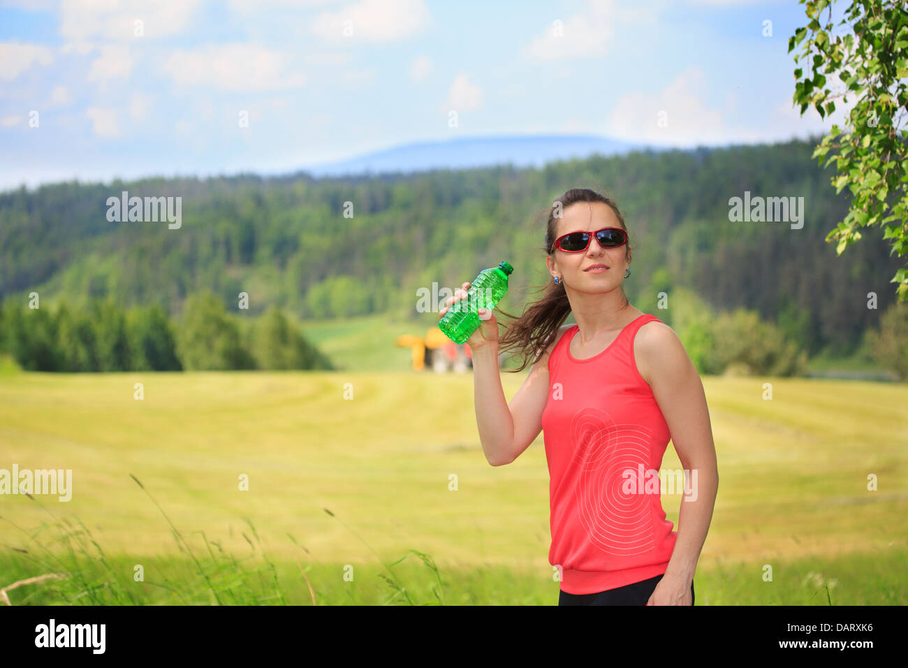 Eine Frau, die eine Pause vom laufen Stockfoto