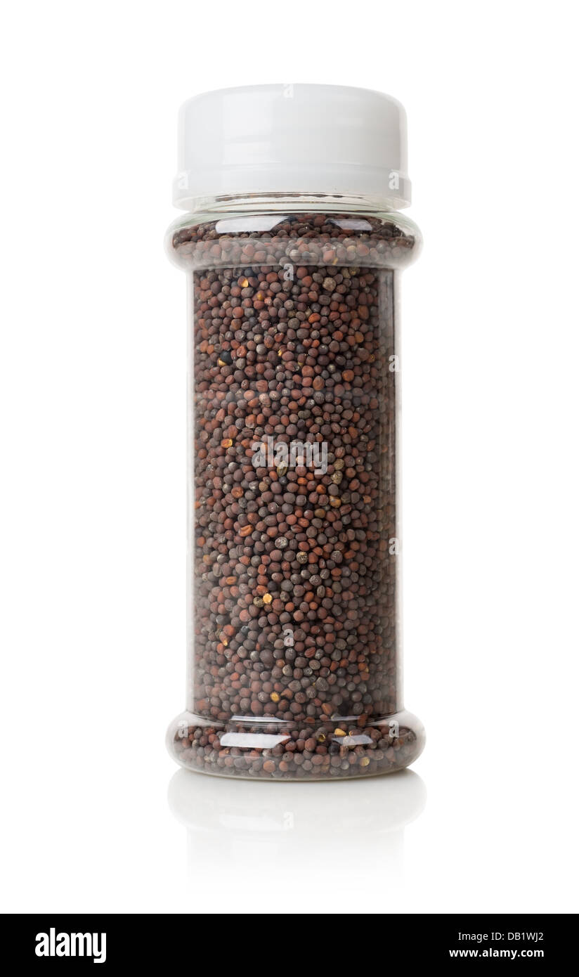 Schwarzer Senf in einem Glas isoliert auf weiss Stockfoto