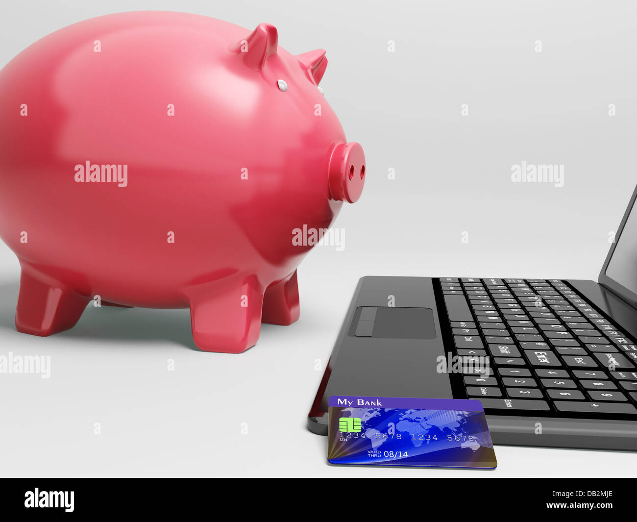Schweinchen am Computer zeigt Banking auf Laptop Stockfoto