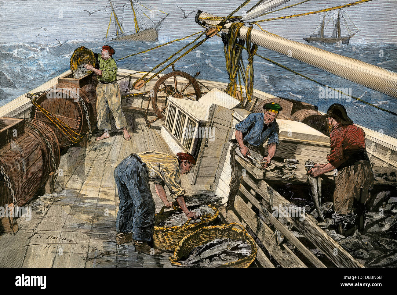 Fischerboot auf den Grand Banks Reinigung der Fang, 1890. Hand - farbige Holzschnitt Stockfoto
