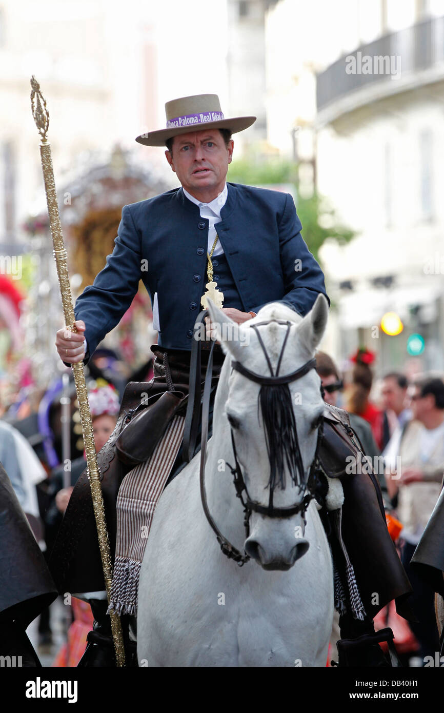 Katholische Pilger auf dem Pferderücken machen die Wallfahrt nach El Rocio aus Jerez in Andalusien, Spanien Stockfoto