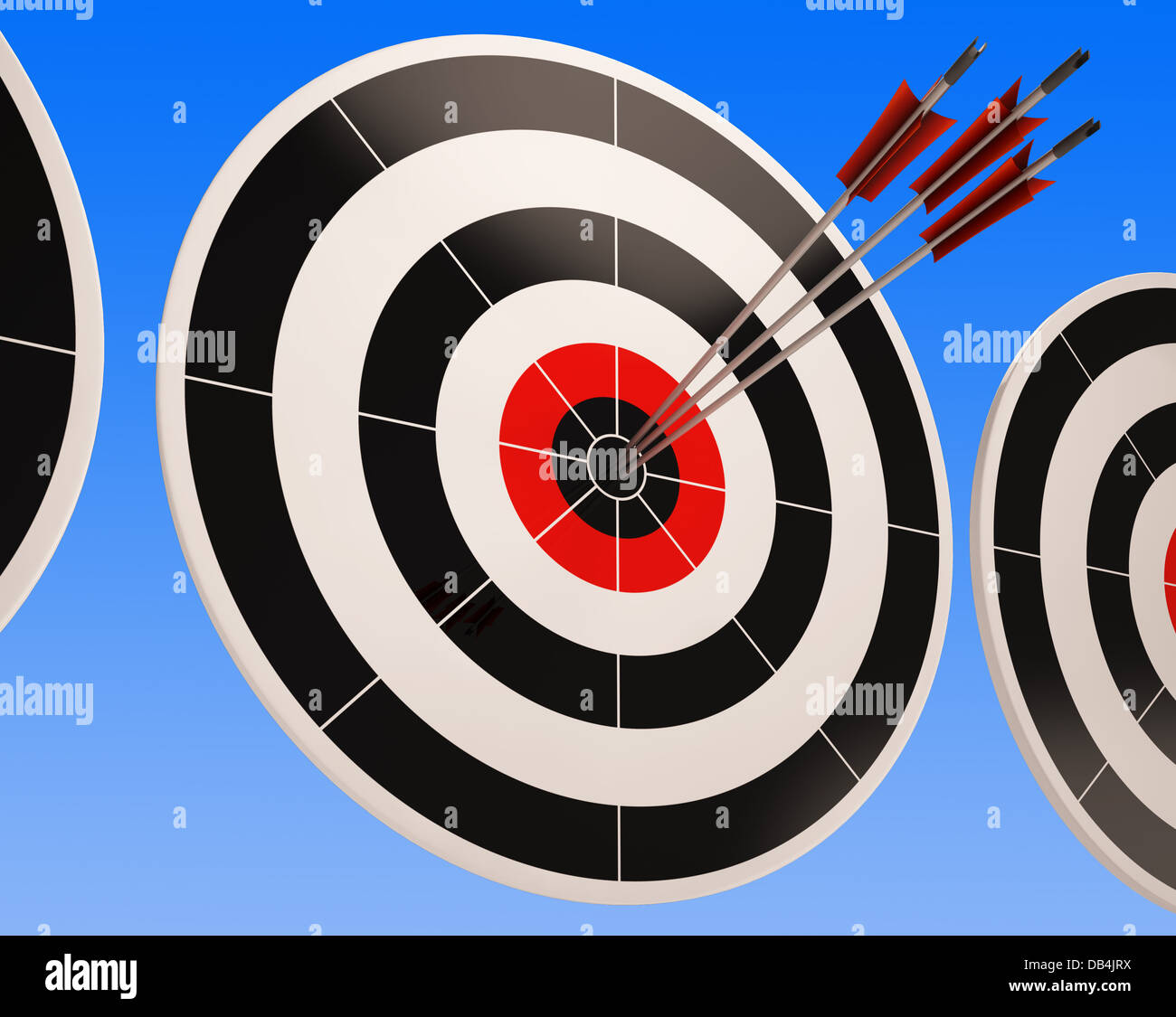 Dreifache Dart zeigt perfekte Aufnahme zu gewinnen Stockfoto