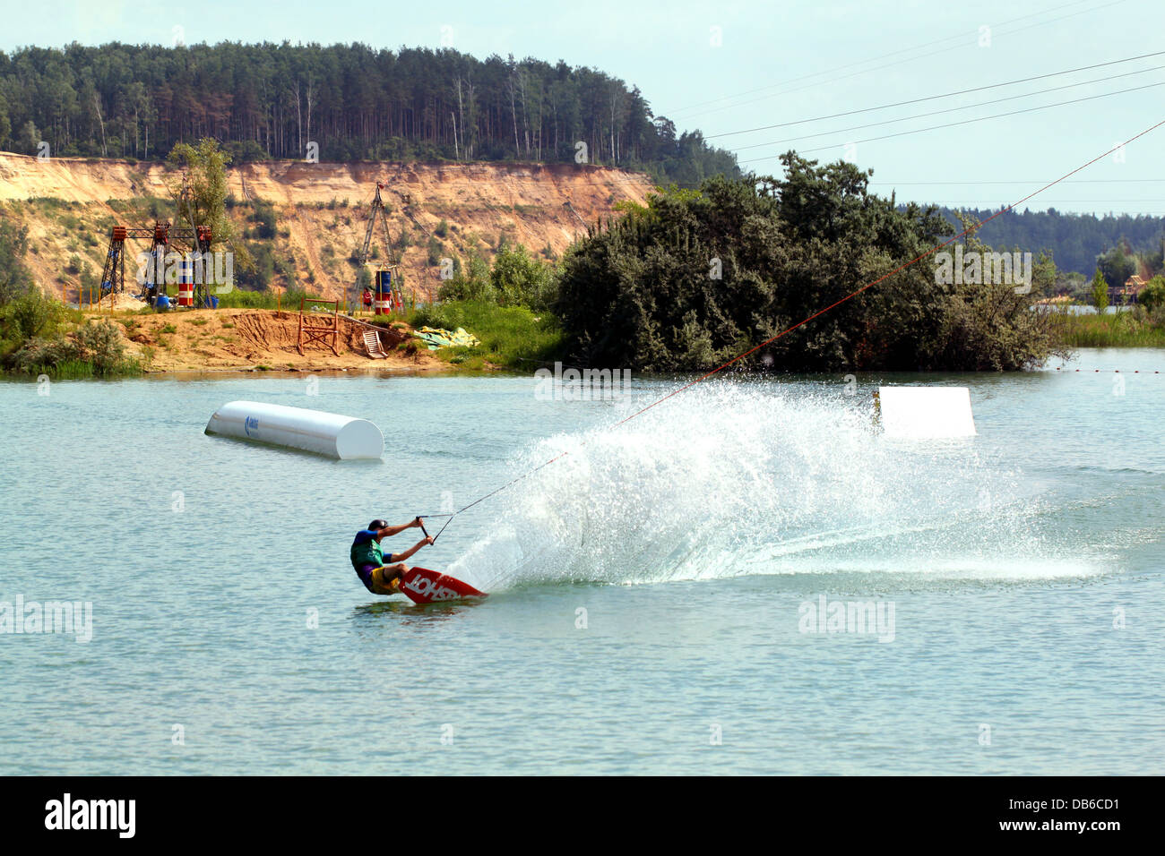 Junge, weibliche Paddel ein paddleboard Stockfoto