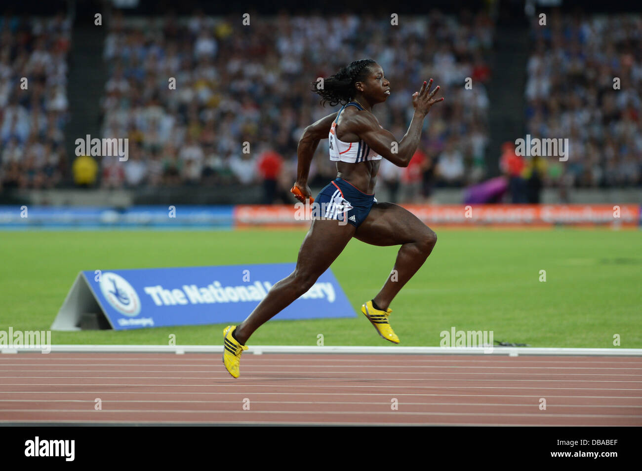 London, UK. 26. Juli 2013. Anyika Onuora hilft die GB Frauen 4 x 100-m-Team zum Sieg bei der London Jubiläum Spiele Diamond League Leichtathletik-Meeting, Juli 26. 2013 Credit: Martin Bateman/Alamy Live News Stockfoto