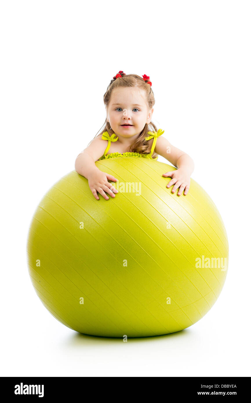 Kind Mädchen Spaß mit Gymnastik Ball isoliert Stockfoto
