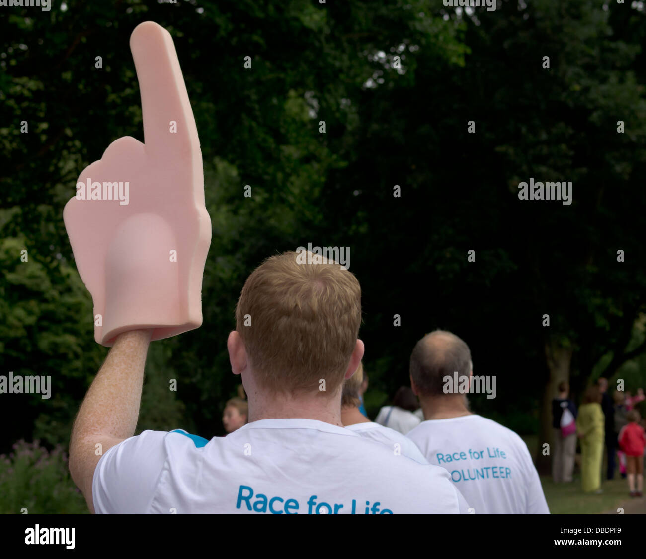 Volunteer in einem Wettlauf um Leben Essex UK Stockfoto