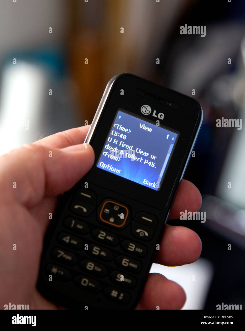 Immer per SMS entlassen ist ein moderner Brauch, London Stockfoto