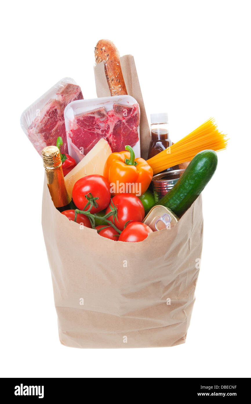 Eine Einkaufstüte voll mit Fleisch mit gesunden Früchten und Gemüse Stockfoto