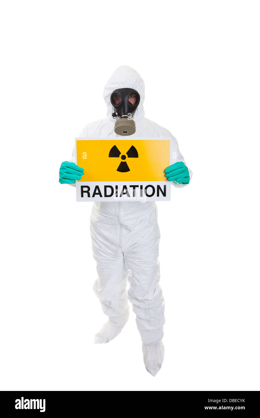Ein Mann in einen Schutzanzug mit einem Schild Stockfoto