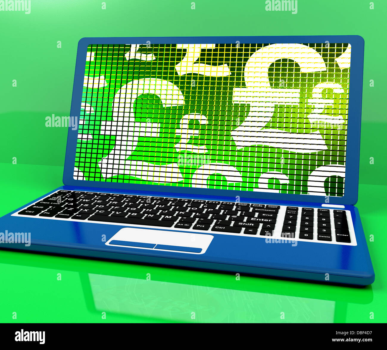 Pfund-Symbole auf Computer mit Geld und Investitionen Stockfoto