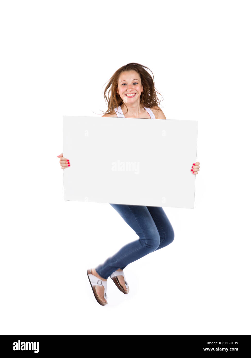 glücklich Teenager-Mädchen springen ein Plakat mit gedrückter Stockfoto