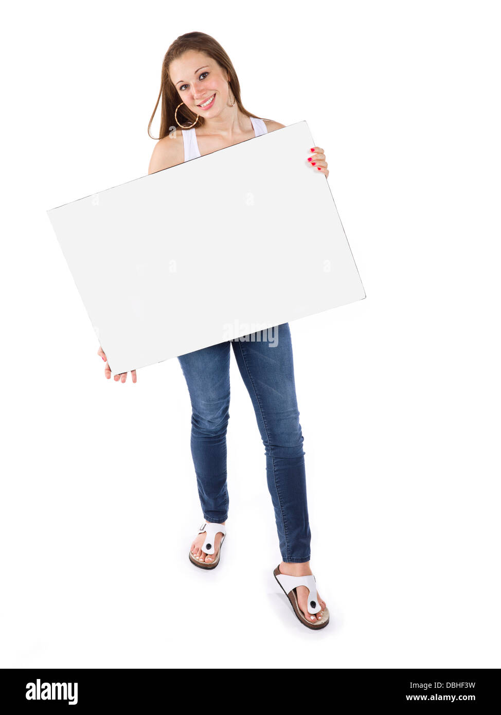 schöne Teenager halten einen leeren Plakatwand Stockfoto