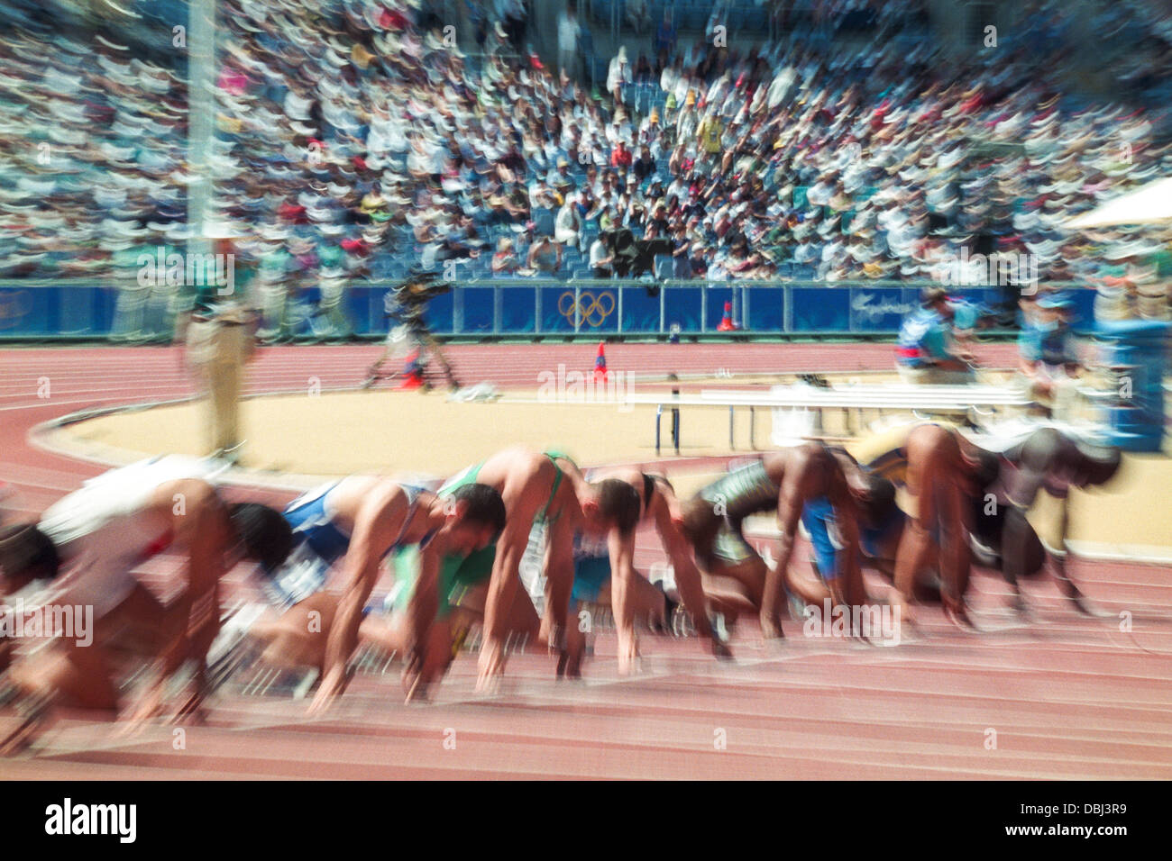 Verwischen Sie Bewegung Bild des Beginns des 100-Meter-Lauf bei den Olympischen Sommerspielen 2000. Stockfoto