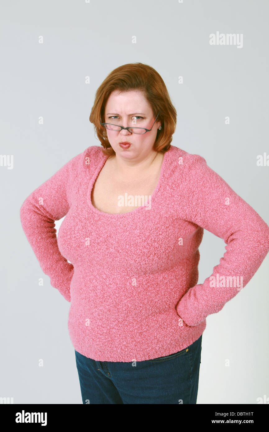 stämmige Frau Grimasse Stockfotografie - Alamy