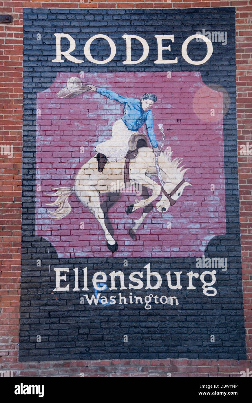 Pferd und Cowboy Wandbild feiert malte Ellensburg Rodeo auf einen Stein Wand in der Innenstadt von Ellensburg, Kittias, Washington, USA Stockfoto
