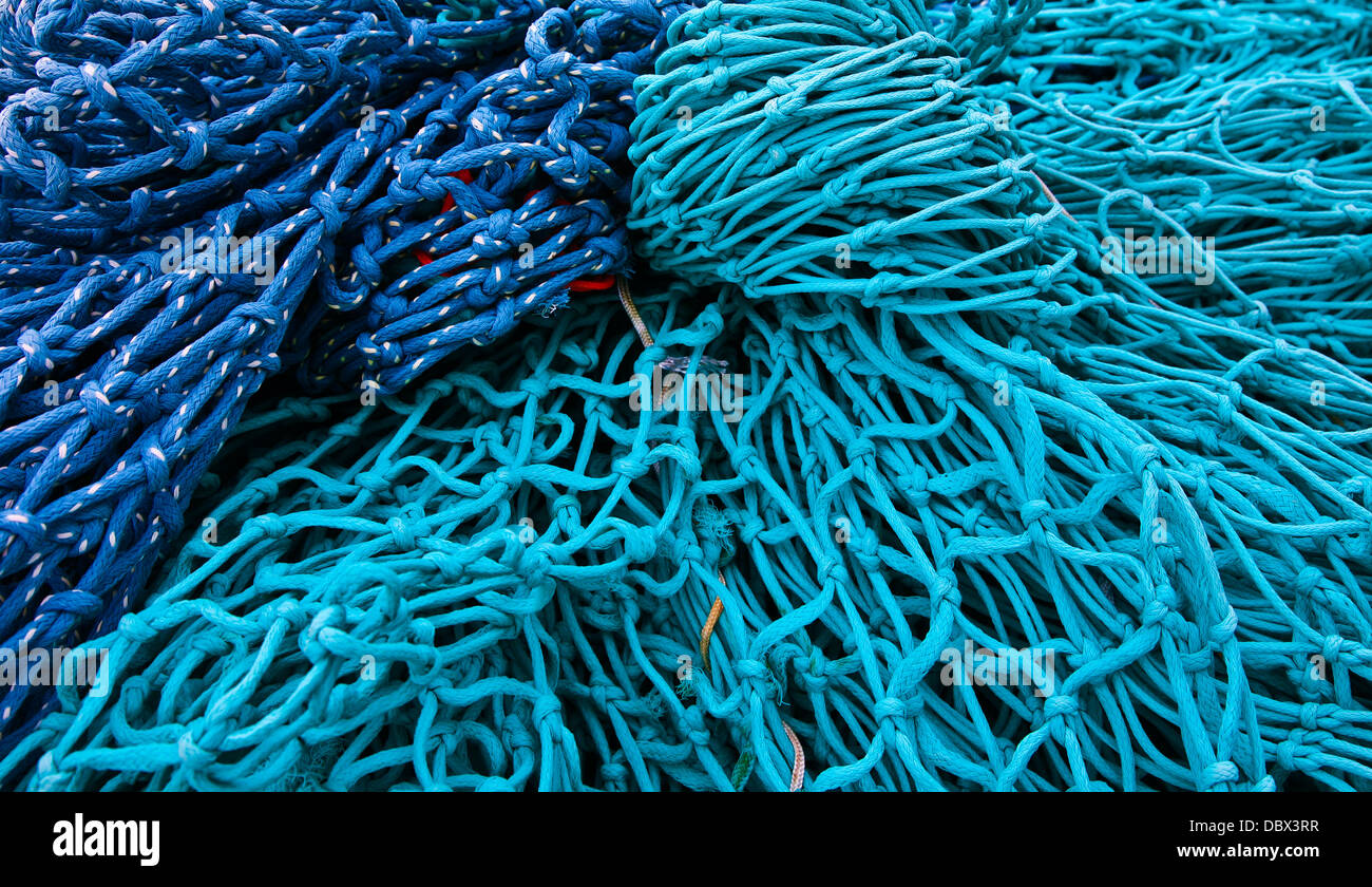 Bunte abstrakte Muster verschmelzen türkisblaues Aqua-Blau aus der Nähe kommerzielle kreative Fischernetze, Dingle, Irland, Europa, Fischnetze Texturen grün Stockfoto