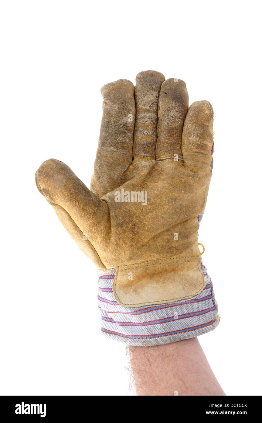 Hand im Handschuh des Arbeitnehmers winken oder Signalisierung zu stoppen Stockfoto