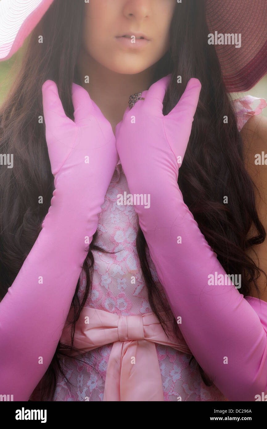 Detailansicht eines Mädchens mit rosa Handschuhe Stockfoto