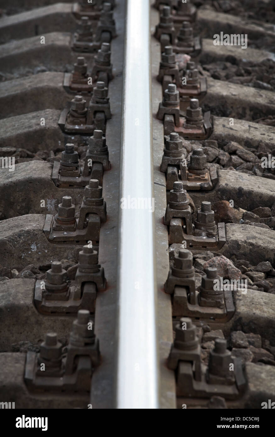 Closeup Eisenbahn Details. Vertikale Fotohintergrund Stockfoto