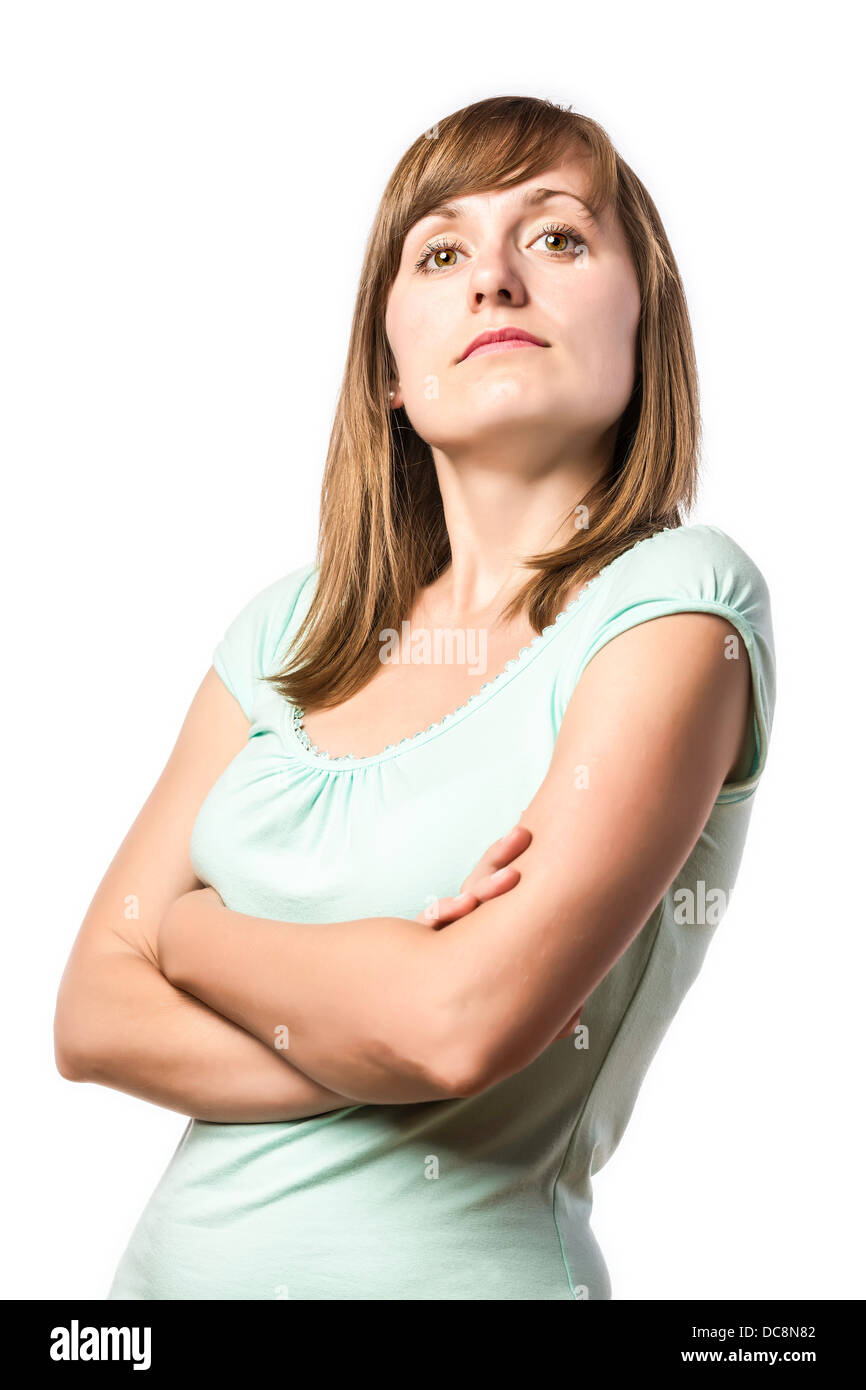 Arrogante aussehende junge hübsche Frau, isoliert auf weißem Hintergrund Stockfoto