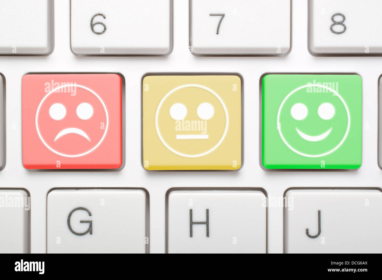 Drei verschiedene freundliches Gesicht Symbol auf Tastatur Stockfoto