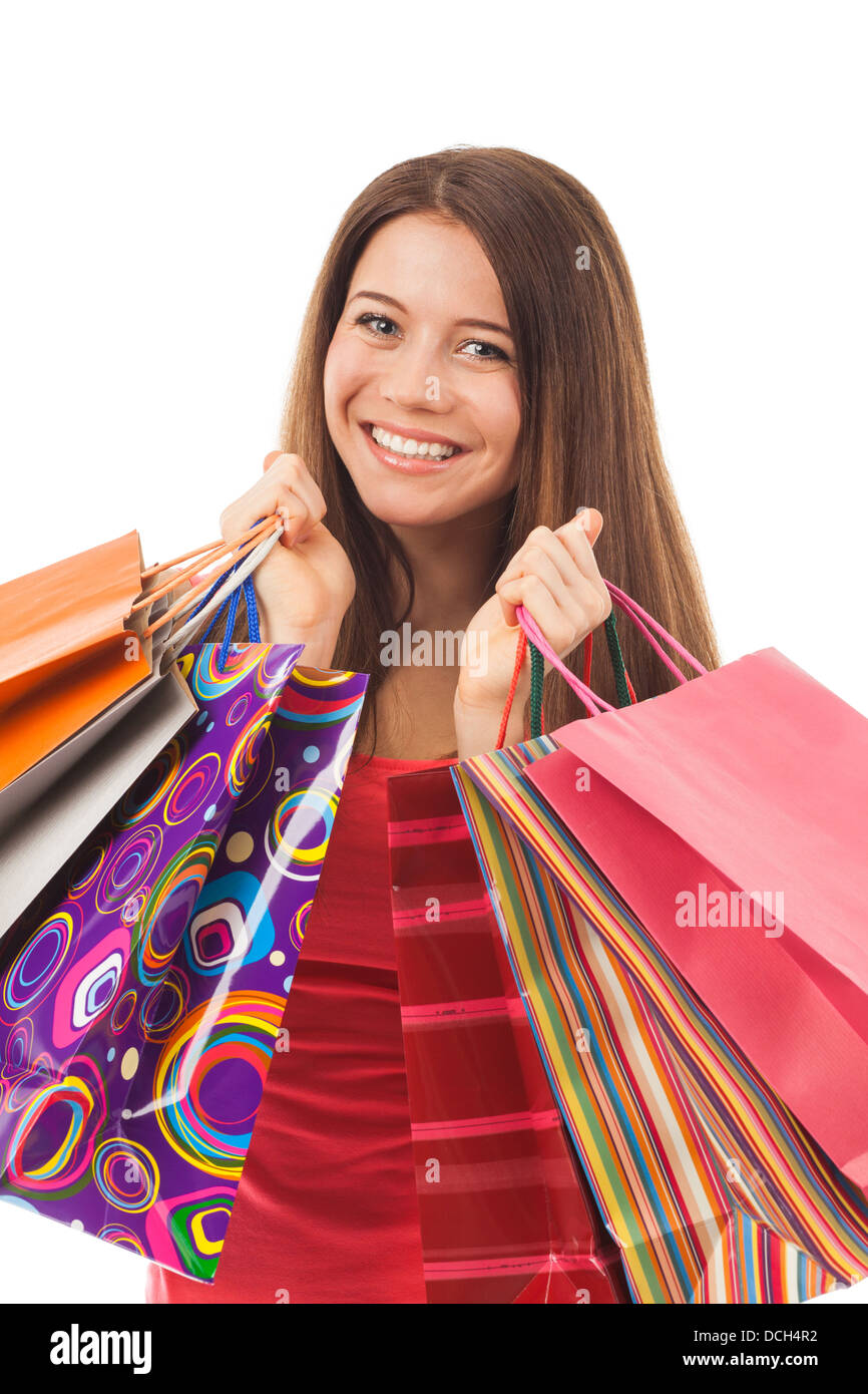 Schöne Frau mit Einkaufstüten, isoliert auf weiss Stockfoto