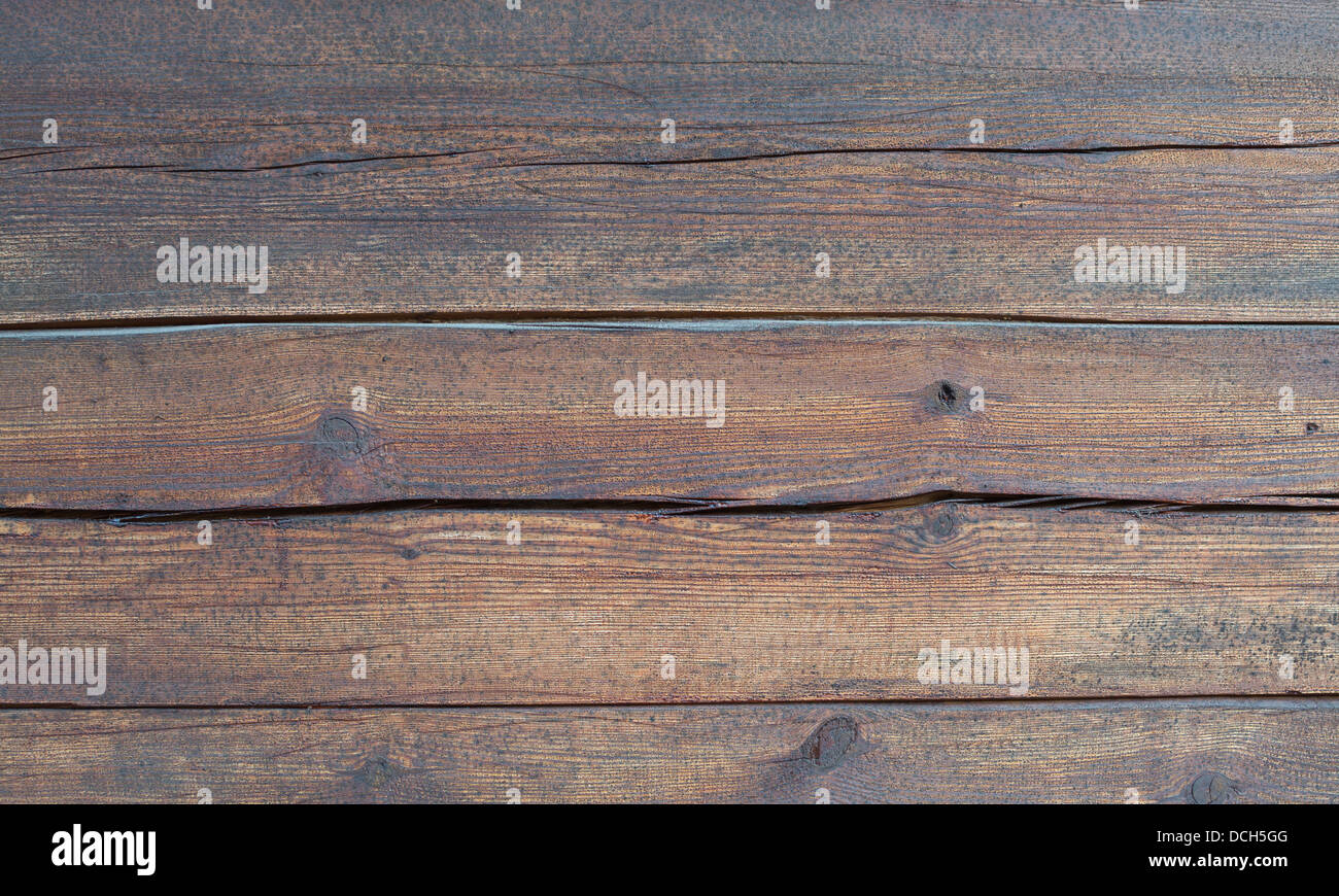 Verwitterte Holz Wand Closeup mit Rissen. Stockfoto