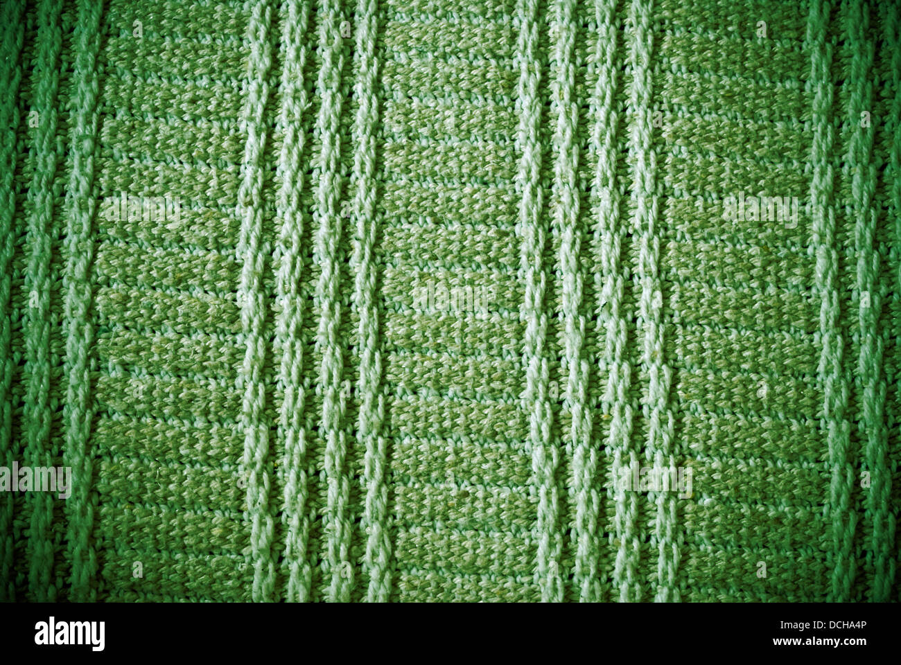 Grasgrün regelmäßige gestreift und gewebte Material Hintergrund oder Textur Stockfoto