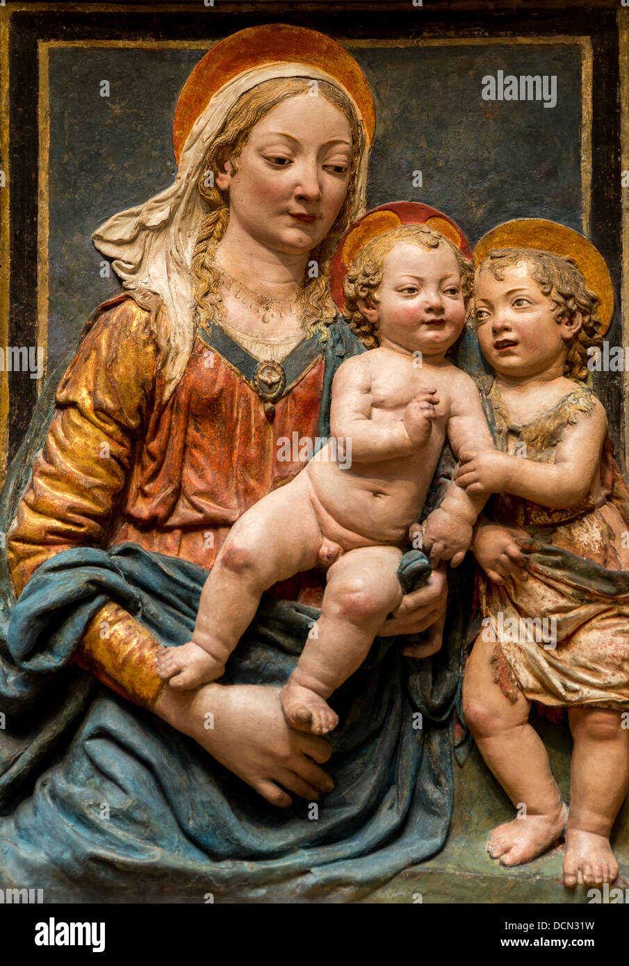 15. Jahrhundert - Madonna mit Kind und Heiligen Johannes, um 1480 - Werkstatt des Andrea del Verrocchio Stockfoto