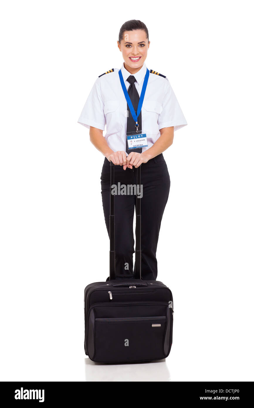 hübschen weiblichen Fluggesellschaft erster Offizier stehend mit Aktentasche isoliert auf weiss Stockfoto